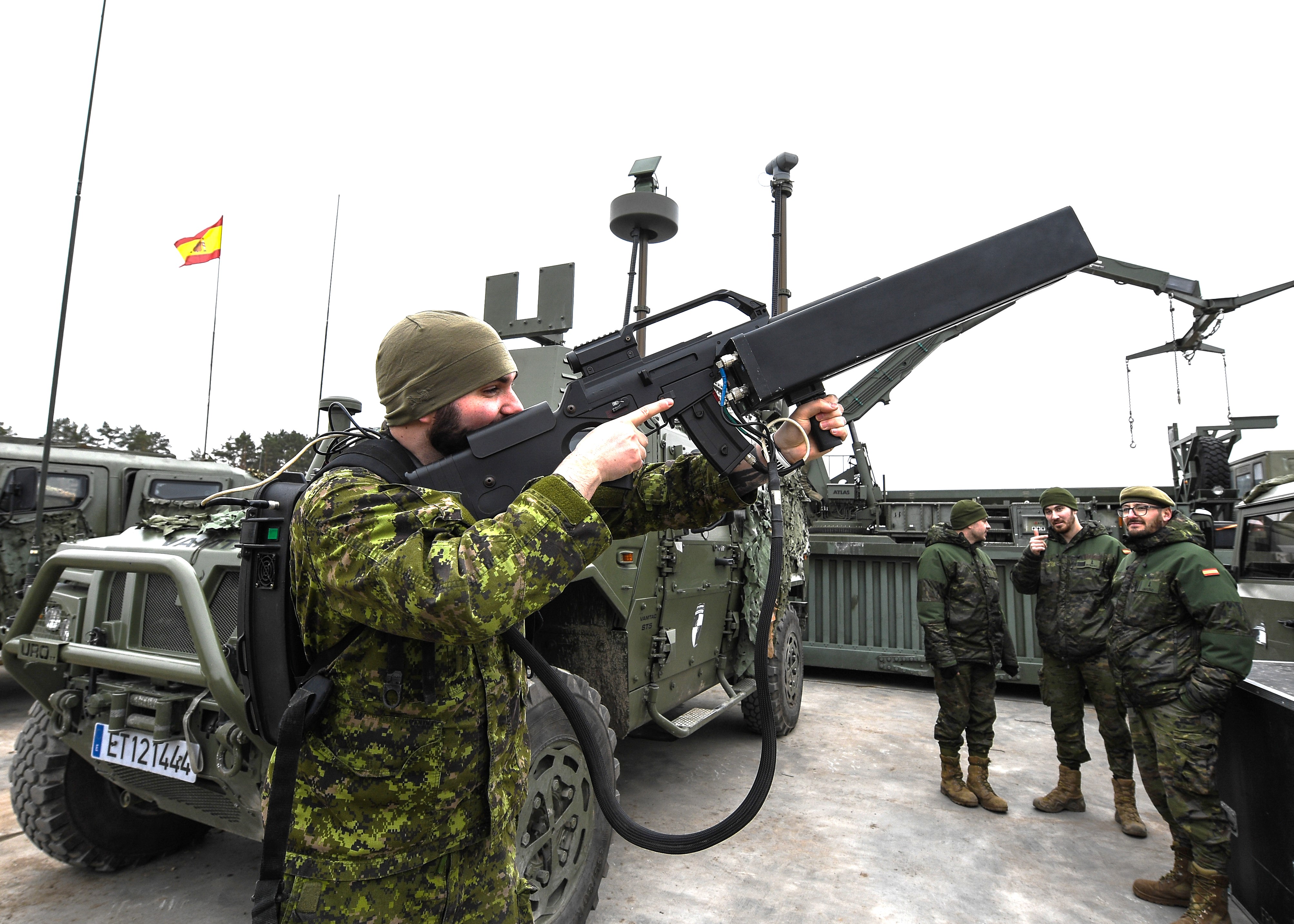AMS student holding a Directed Energy Weapon