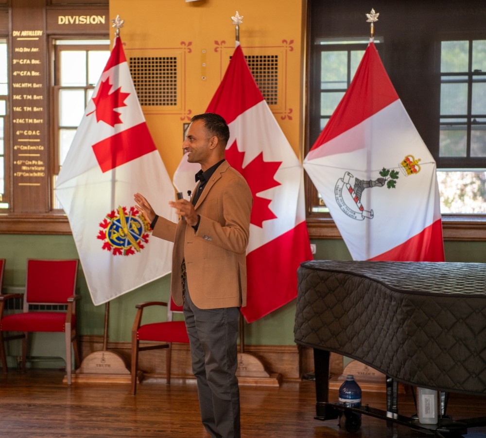 Maj (Ret) Janjua answers questions from the audience in historic Curry Hall.
